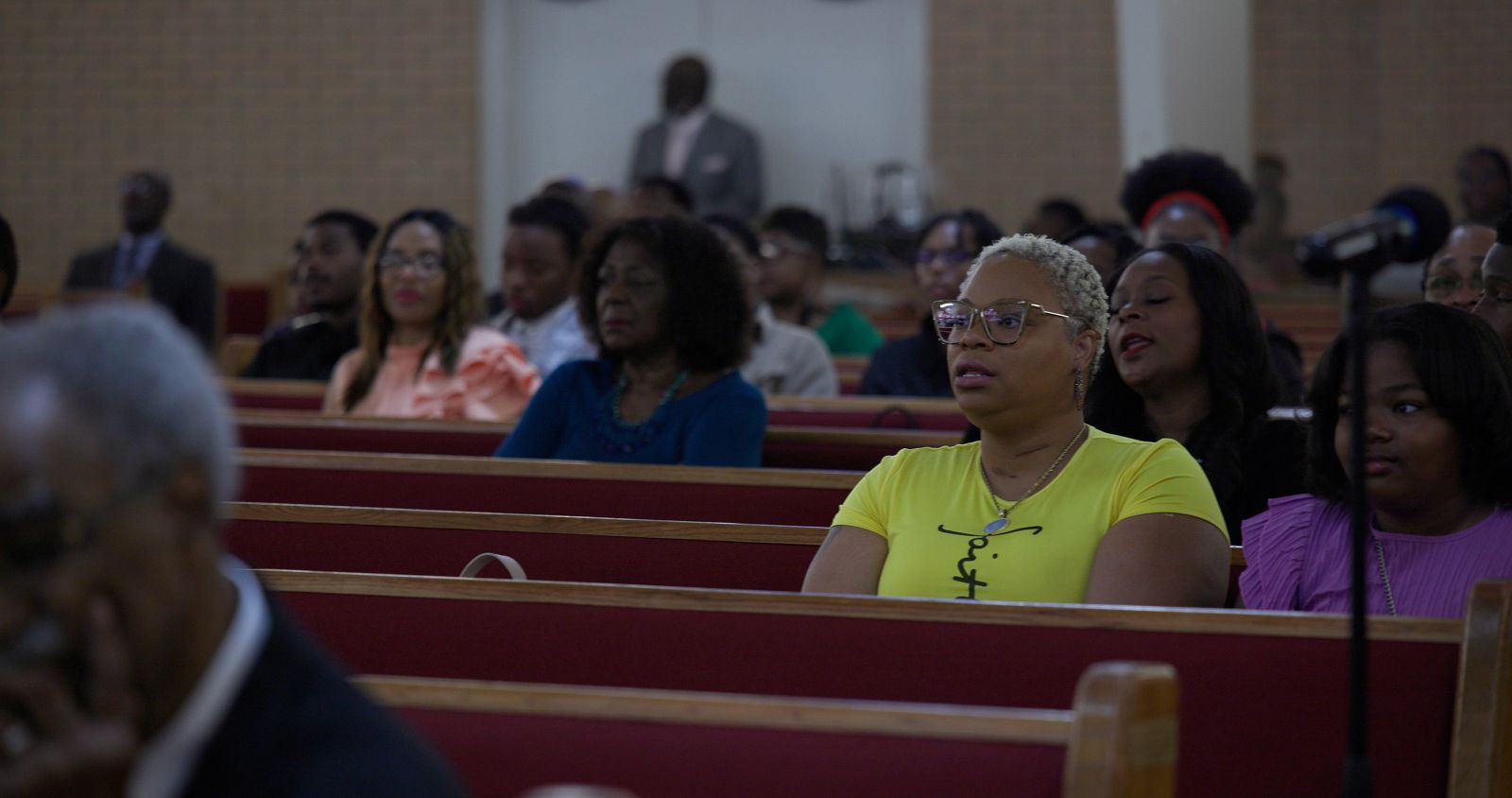 Congregation sitting and listening to a sermon